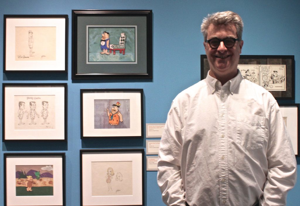 Fred Seibert with a few drawings from one of his favorite cartoon series, ‘The Flintstones’. Photo by Marisa Losciale
